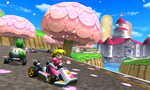 Peach and Yoshi race on Mario Circuit.