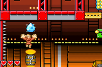 Donkey Kong jumps up to a Crystal Coconut in K. Kruizer III Engine in DK: King of Swing