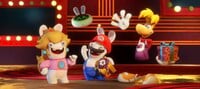 Rabbid Peach, Rabbid Mario and Rayman waving to the camera in Mario + Rabbids Sparks of Hope