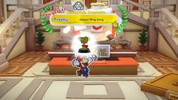Mario being given one of the 15 Trophies by the Musée Champignon curator in Toad Town of The Origami King.