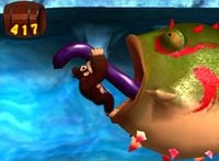 Donkey Kong pulls the tongue of a Rolling Frog in Donkey Kong Jungle Beat
