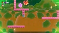 The second 10-flower coin in Deep Magma Bog Special Solar Roller in Super Mario Bros. Wonder