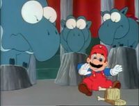 Mario in a cage in the episode Send in the Clown.