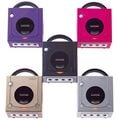 Five color designs of the GameCube, including the unreleased Hot Pink variant