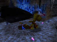 A 5-Banana Coin and a set of purple Banana Bunches in Crystal Caves.