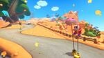 Stilt Guys on the Yoshi's Island course in Mario Kart 8 Deluxe