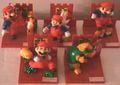 A series of five figurines based on the Super Mario Bros. game