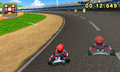 Mario racing in Time Trials at N64 Luigi Raceway.
