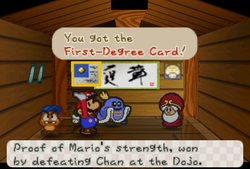 Mario receiveing a First-Degree Card from Master in Toad Town of Paper Mario.