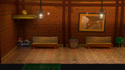 Mario near the Close Call P badge in Riverside Station of Paper Mario: The Thousand-Year Door for Nintendo Switch.
