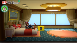 Mario standing near a Healing Heart on The Princess Peach ship of The Origami King.