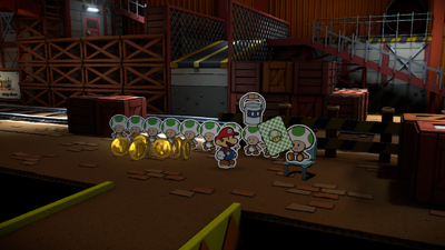 Mario being given a 1-Up Mushroom Battle Card in Toad Trainworks of Paper Mario: Color Splash.