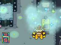 Bowser receiving Negative Ions from a Shop Block in Bowser Path