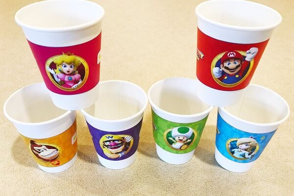 Photograph of several cups in Mario Party: Star Rush wrappers
