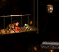 The Kongs stand near a Continue Barrel
