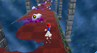 Mario runs past a Mattermouth in Super Mario Galaxy 2.