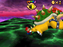 Fight with Bowser in the N64 version (left) and the DS version (right)