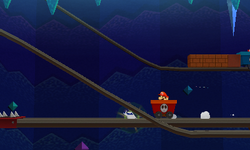 Mario near the Mine-Cart Rail scrap in Bowser's Snow Fort of Paper Mario: Sticker Star.