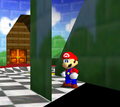 Mario under the stairs.