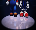Mario and Sonic standing in the spotlight