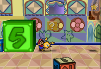 Image of Mario revealing a hidden ? Block in Shy Guy's Toy Box, in Paper Mario.