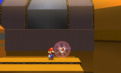 Mario near a HP-Up Heart in Yoshi Sphinx of Paper Mario: Sticker Star.