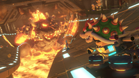 Bowser driving through Bowser's Castle in Mario Kart 8