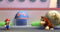 Mario noticing Donkey Kong with a bag full of Mini-Marios.