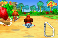 Funky Kong racing in the Steamy Swoop course of Diddy Kong Pilot 2003.
