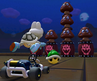 Thumbnail of the Mii Cup challenge from the 2023 New Year's Tour; a Goomba Takedown challenge set on SNES Ghost Valley 2