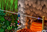 Mario and Sushie riding the zipline to Mt. Lavalava
