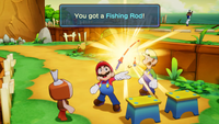 The Bros. receiving a Fishing Rod.
