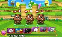 Screenshot of the boss battle in World 1-1, from Puzzle & Dragons: Super Mario Bros. Edition.