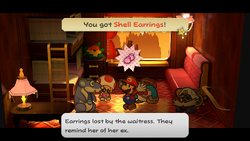 Mario getting a Shell Earrings from Doopliss (disguised as Zip Toad) on Excess Express of Paper Mario: The Thousand-Year Door for Nintendo Switch.