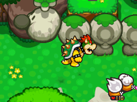 Bowser next to a Wiggler statue in Dimble Woods
