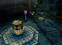 A purple Banana Bunch and a purple Banana Balloon in Creepy Castle.