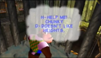 Chunky Kong imprisoned in a hanging cage in Frantic Factory of Donkey Kong 64