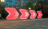 An arrow field on Tour New York Minute in Mario Kart 8 Deluxe (in Mirror mode)