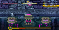 A screenshot of Wario fighting Rollanratl.