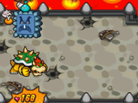 Bowser doing a shell defense during a battle with a Sniffle Thwomp in the underground area of Bowser Castle