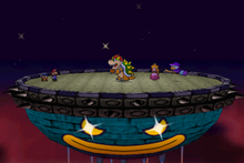 Mario, Goombario, Bowser, Princess Peach, and Kammy Koopa on the Power Platform.
