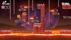 Screenshot of Fire Mountain level 3-6 from the Nintendo Switch version of Mario vs. Donkey Kong