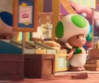 Princess Daisy's emblem at a bakery shop in The Super Mario Galaxy Movie