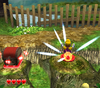 Wario above a treasure button in Wario World