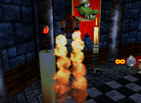 A red Banana Bunch and a Golden Banana for Diddy Kong in Creepy Castle.