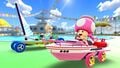 Rosalina (Swimwear) and Toadette (Sailor) driving on the course