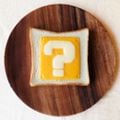 Photo of a toast with a piece of ? Block shaped cheese from Nintendo Co., Ltd.'s LINE account
