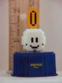 Pixelated figurine of a Lakitu's Cloud with a coin on top