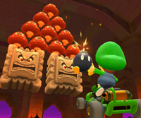 Thumbnail of the Diddy Kong Cup challenge from the November–December 2022 Peach vs. Bowser Tour; a Goomba Takedown challenge set on GBA Bowser's Castle 3