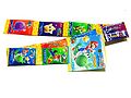 Soda-flavored chewing gum candy, having ten pieces of gum, and two cards. There are twenty cards to collect, with the front side showing individual characters, and the back side showing a partial image, as part of a puzzle. Based on Super Mario Galaxy 2.